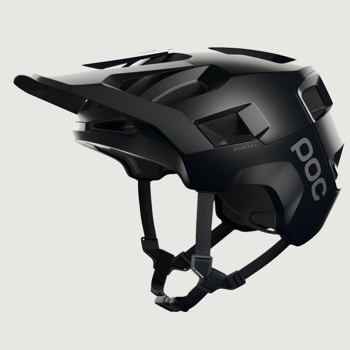 Casco da bici POC Kortal nero opaco con calotta estesa sulla nuca, visto di tre quarti